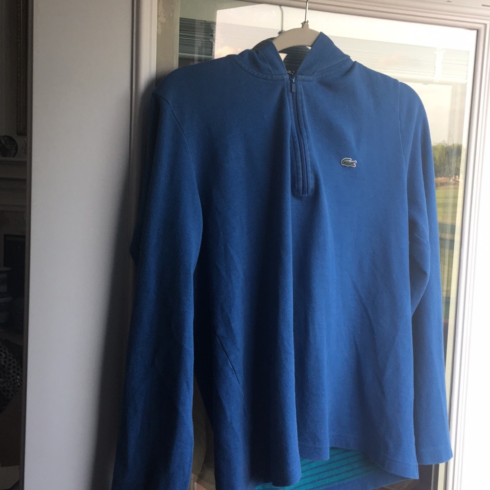A Lacoste hoodie